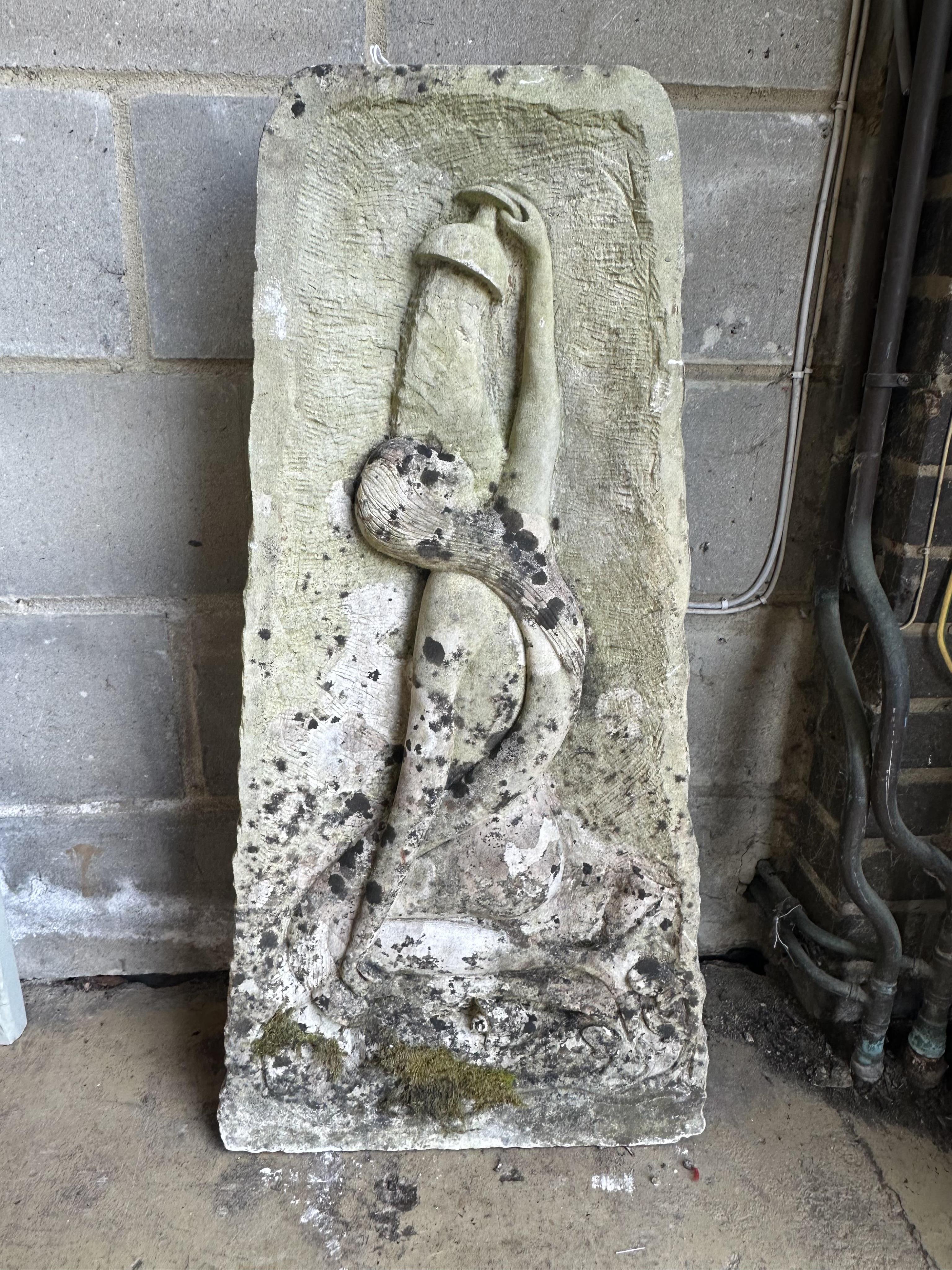 A stone corner piece decorated with a mermaid, height 90cm. Condition - fair